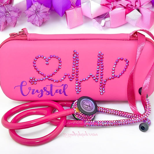 Introducing the Cotton Candy Littmann Classic III Stethoscope, a delightful blend of functionality and style! Featuring a vibrant Rainbow Finish and eye-catching raspberry-colored tubing, this stethoscope stands out with its individually placed iridescent rhinestones on the chest piece and headset. To top it off, it comes with a matching protective hard case and a personalized name displayed in shimmering purple font, making it both a practical tool and a unique expression of your personality!