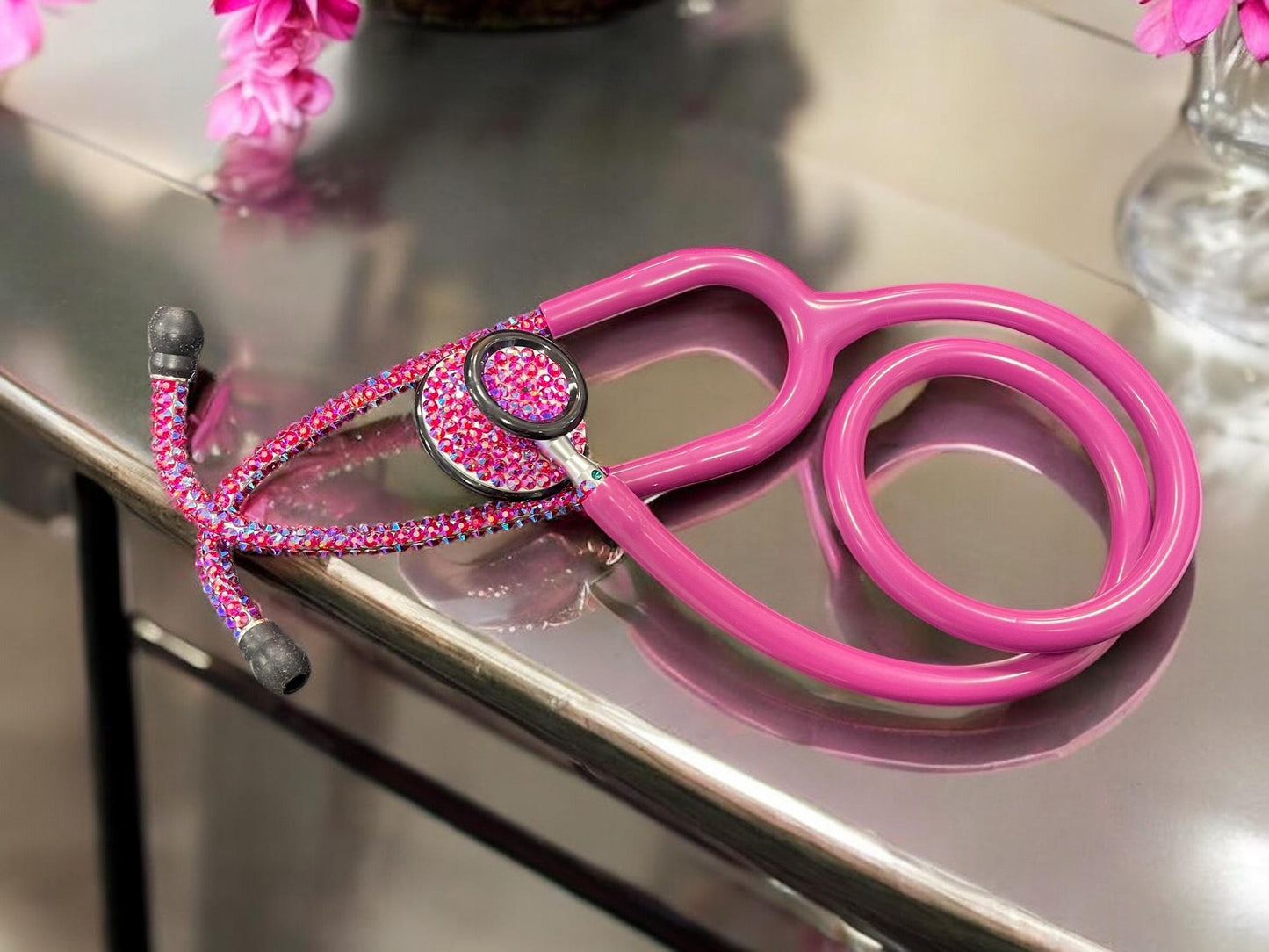Cotton Candy Prestige Medical Stethoscope, Model 121, Raspberry color tubing, individually placed Iridescent rhinestones on the chest piece and headset designed by Blingbykey. See other listings for matching custom protection hard case.