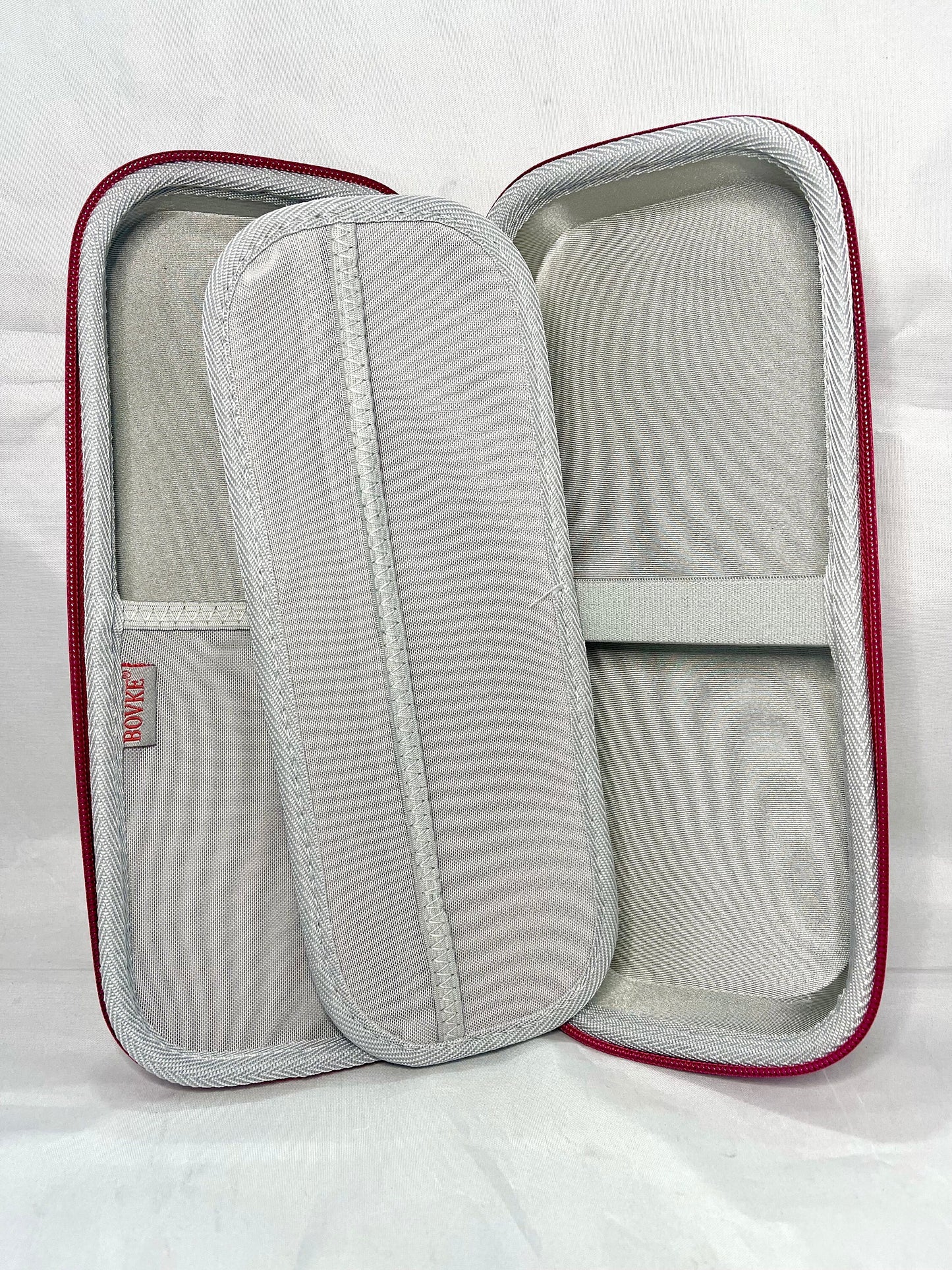 Stethoscope Case - Style B (Extra Storage Space, Middle Flap) Open pink carrying case with a gray soft interior lining. The case has a zipper closure and a mesh pocket on the inside and middle flap.